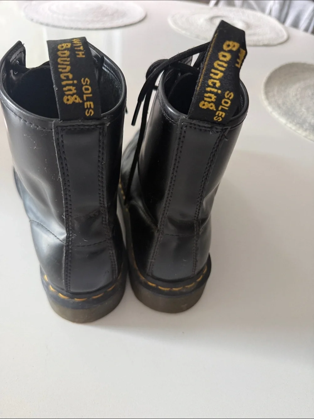 Dr. Martens Black Leather 8-Eye Lace-Up Boots with Yellow Stitching